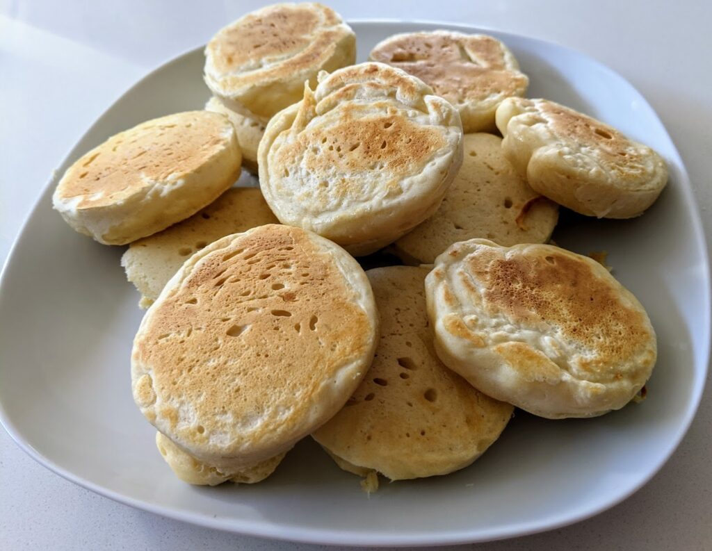 This image has an empty alt attribute; its file name is Crumpets_5-1-1024x793.jpg