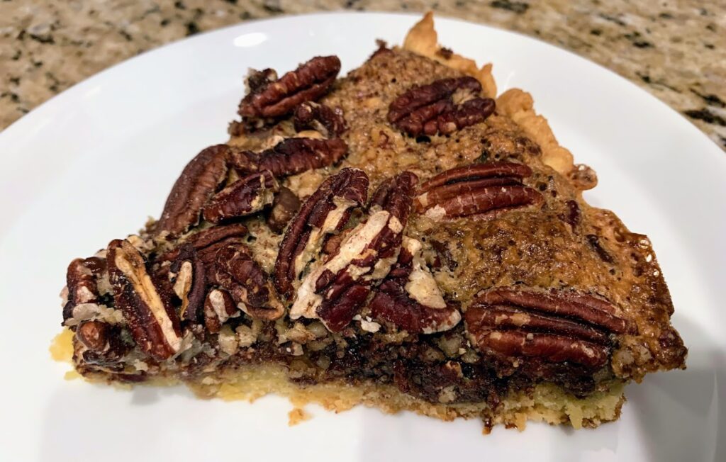 This image has an empty alt attribute; its file name is Chocolate-Pecans-Pie_7-1024x652.jpg